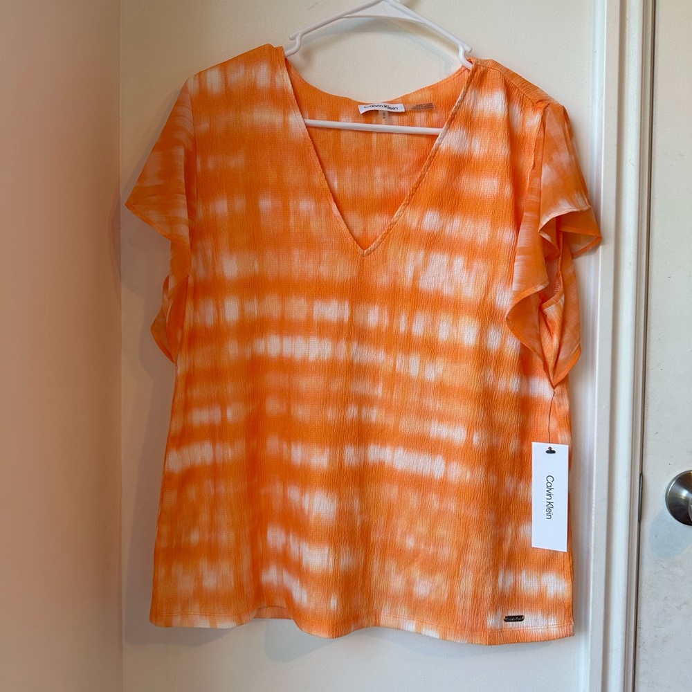 Calvin Klein orange shirt